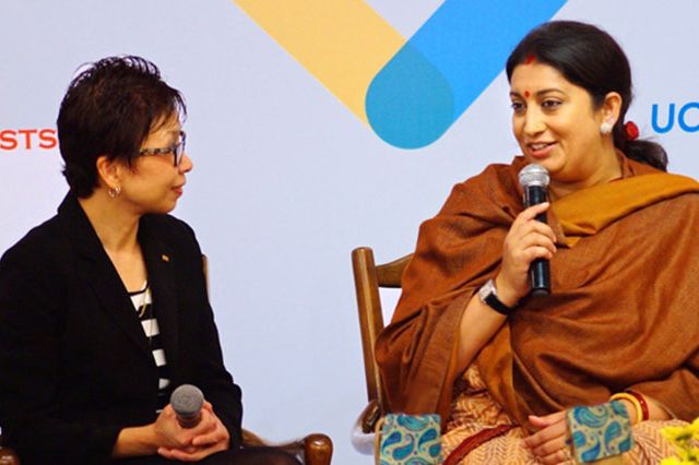 Smriti Zubin Irani, Indian minister of human resource development, speaks with UCLA Vice Provost Cindy Fan at the UCLA-Tata Global Forum held in New Delhi this week.